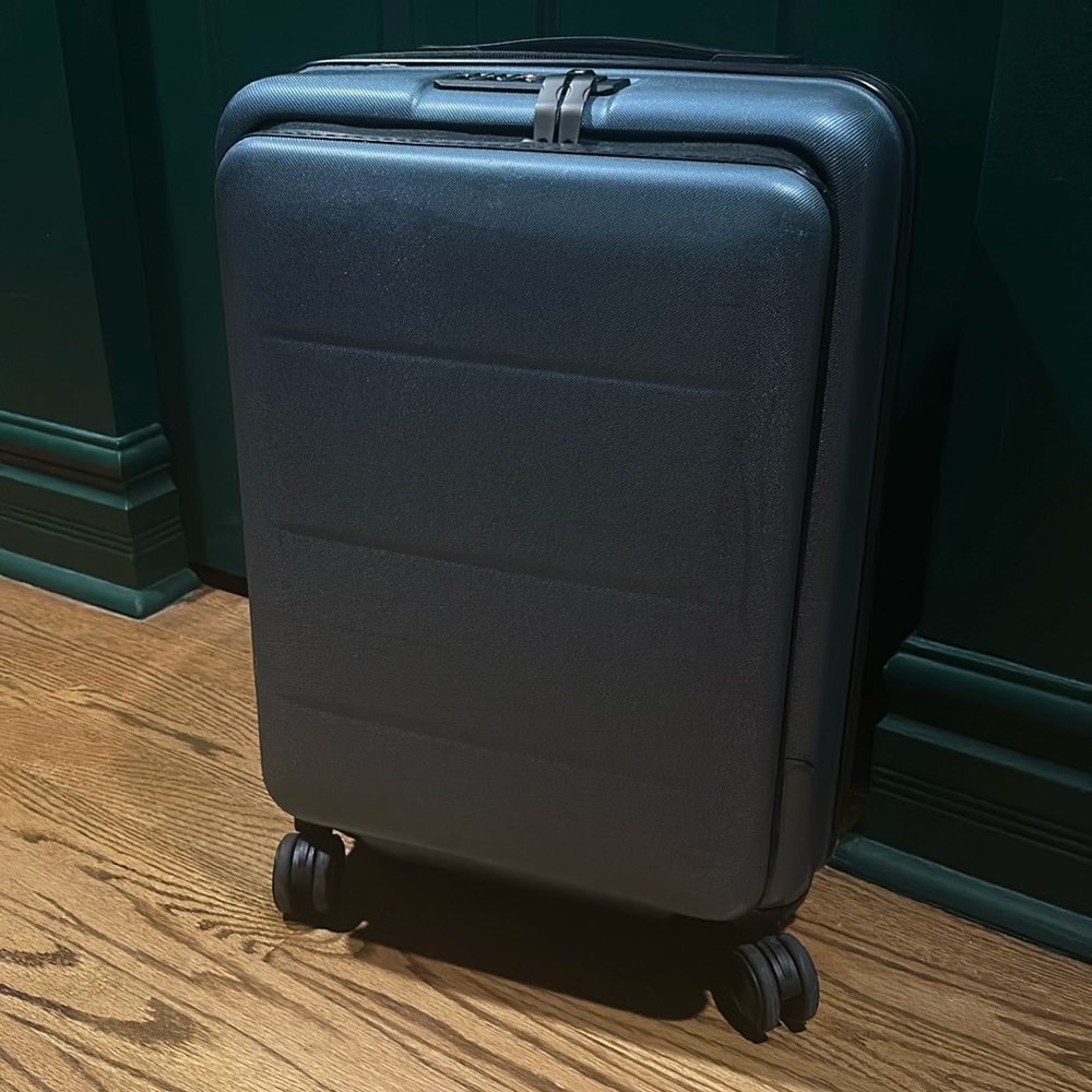 Blue carry on suitcase